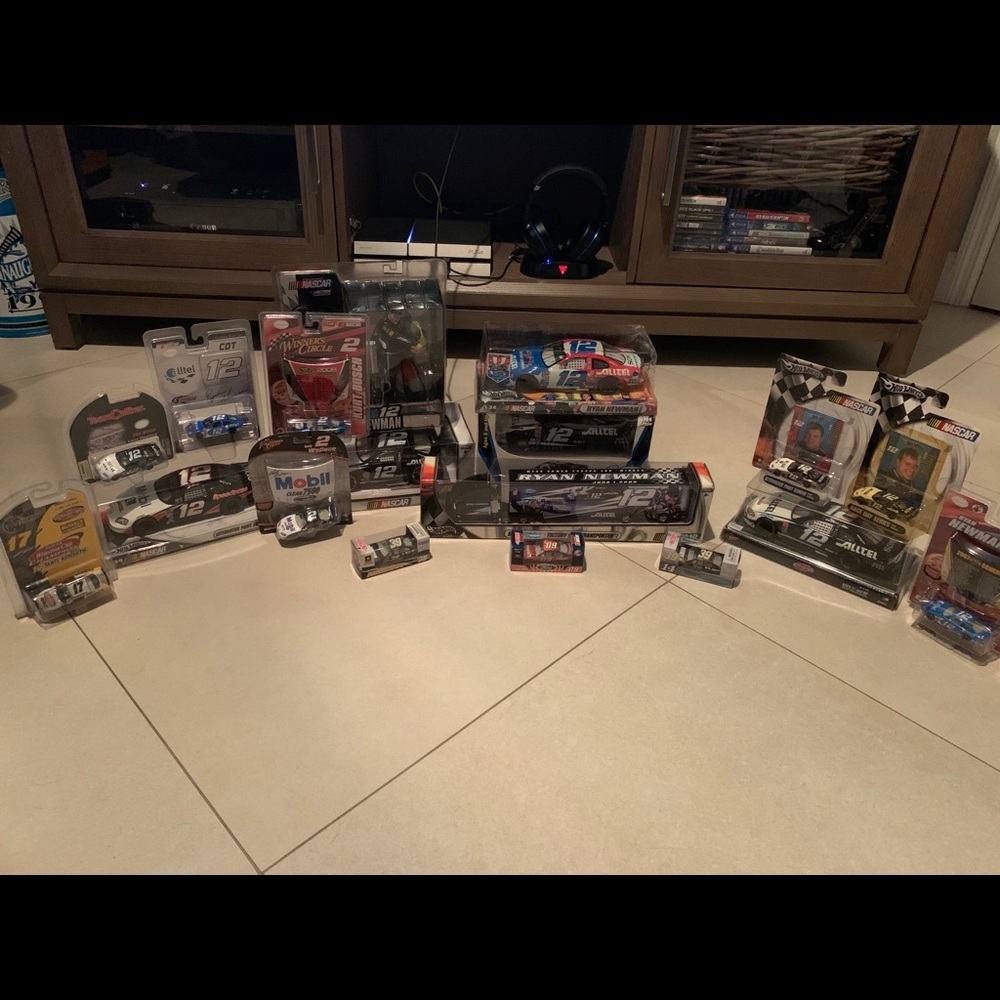 Brand new nascar collection with cars and trailer.